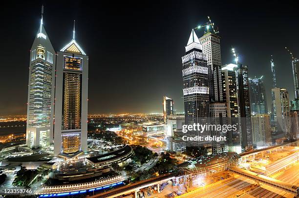 dubai emirates tower - emirates towers stock pictures, royalty-free photos & images