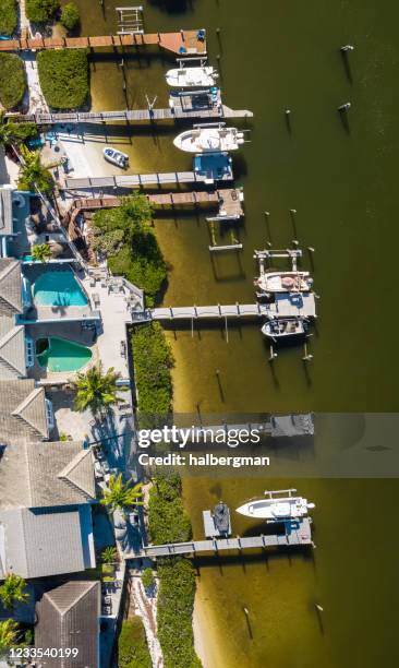 aerial panorama of jupiter harbour docks and houses - jupiter florida stock pictures, royalty-free photos & images