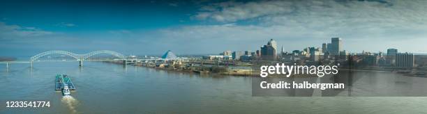 drone panorama of the hernando de soto bridge, mud island and downtown memphis - memphis winter stock pictures, royalty-free photos & images