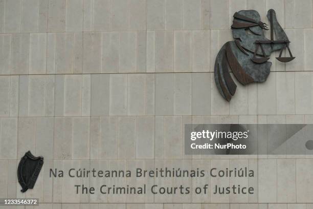 Signage with Lady Justice insignia at the entrance to the Criminal Courts of Justice in Dublin. On Thursday, 17 June 2021, in Dublin, Ireland.