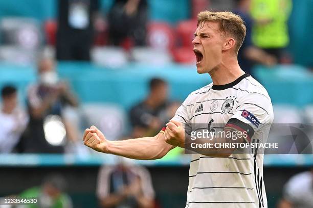 Germany's midfielder Joshua Kimmich reacts after the UEFA EURO 2020 Group F football match between Portugal and Germany at Allianz Arena in Munich,...