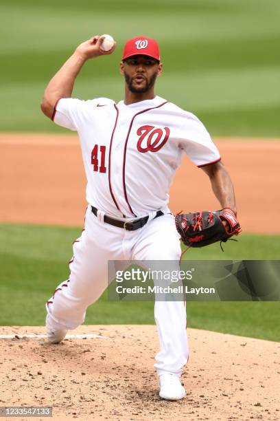 Joe Ross of the Washington Nationals pitches in the third inning during game one of a doubleheader baseball game against the New York Mets at...