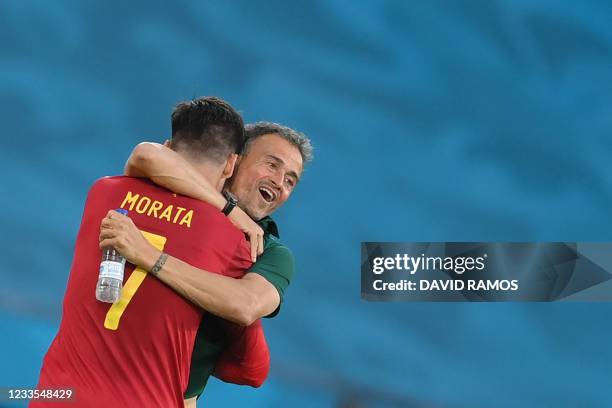 Spain's forward Alvaro Morata celebrates hi sgoal with Spain's coach Luis Enrique during the UEFA EURO 2020 Group E football match between Spain and...