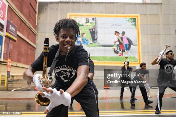 People participate in a parade to celebrate Juneteenth on June 19, 2021 in Atlanta, Georgia. Juneteenth marks the end of slavery in the United States...