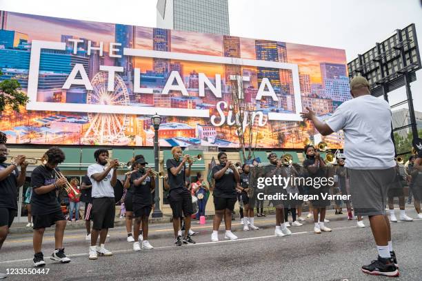 Band participates in a parade to celebrate Juneteenth on June 19, 2021 in Atlanta, Georgia. Juneteenth marks the end of slavery in the United States...