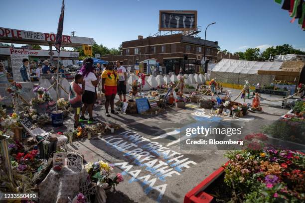 Attendees visit George Floyd Square during a Juneteenth celebration in Minneapolis, Minnesota, U.S. On Saturday, June 19, 2021. President Joe Biden...