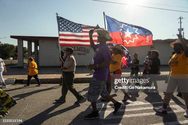 Members of Reedy Chapel African Methodist Episcopal Church march to celebrate Juneteenth on June 19, 2021 in Galveston, Texas. Juneteenth marks the...