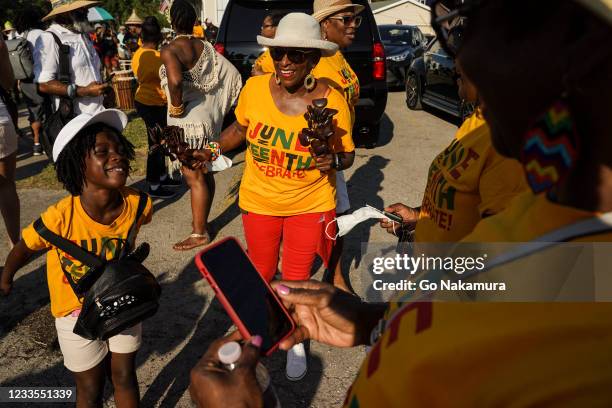 Members of Reedy Chapel African Methodist Episcopal Church gather to celebrate Juneteenth on June 19, 2021 in Galveston, Texas. Juneteenth marks the...