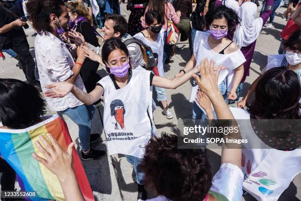 Protesters are seen dancing during the demonstration. A protest against Turkey's withdrawal from the Istanbul Convention, an international accord...