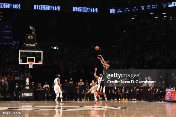 Kevin Durant of the Brooklyn Nets shoots the ball to send the game into overtime against the Milwaukee Bucks during Round 2, Game 7 on June 19, 2021...