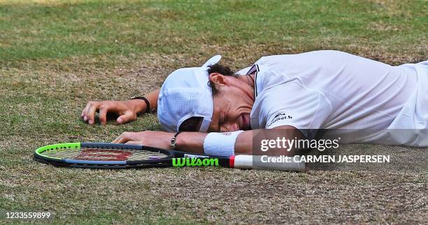 France's Ugo Humbert reacts after defeating Russia's Andrey Rublev in their final match at the ATP 500 Halle Open tennis tournament in Halle, western...