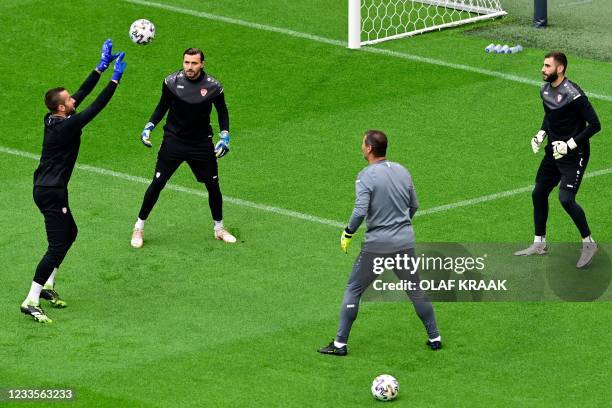 North Macedonia's goalkeeper Damjan Siskovski, North Macedonia's goalkeeper Stole Dimitrievski and North Macedonia's goalkeeper Risto Jankov attend...