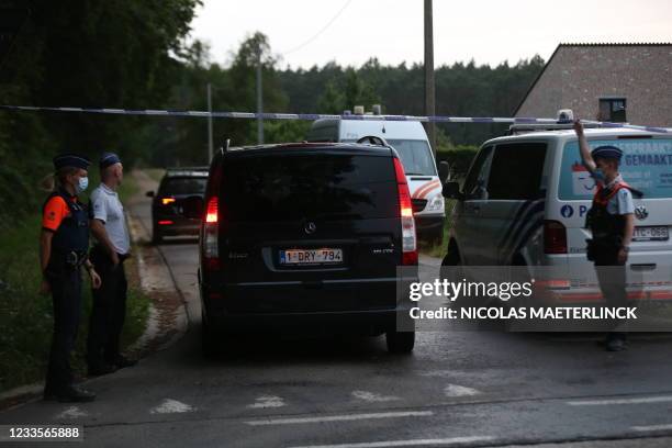 Vehicle, possibly a hearse to transport the corpse of Jurgen C., arrives at the Dilserbos, a forest area of Nationaal Park Hoge Kempen in...