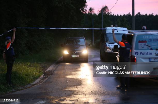 Hearse allegedly carrying the body of fugitive soldier Jurgen Conings leaves the Dilserbos, a forest area of Nationaal Park Hoge Kempen in...