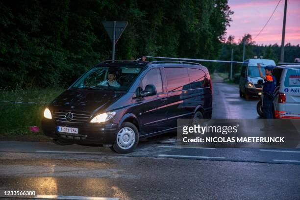 Hearse to transport the corpse of Jurgen C. Leaves the Dilserbos, a forest area of Nationaal Park Hoge Kempen in Dilsen-Stokkem, Limburg province,...