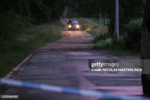 Hearse allegedly carrying the body of fugitive soldier Jurgen Conings leaves the Dilserbos, a forest area of Nationaal Park Hoge Kempen in...