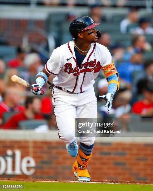 Ronald Acuna Jr. #13 of the Atlanta Braves watches the ball after hitting his 100th career home run in the third inning of game two of a doubleheader...