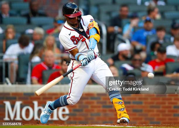 Ronald Acuna Jr. #13 of the Atlanta Braves hits his 100th career home run in the third inning of game two of a doubleheader against the St. Louis...