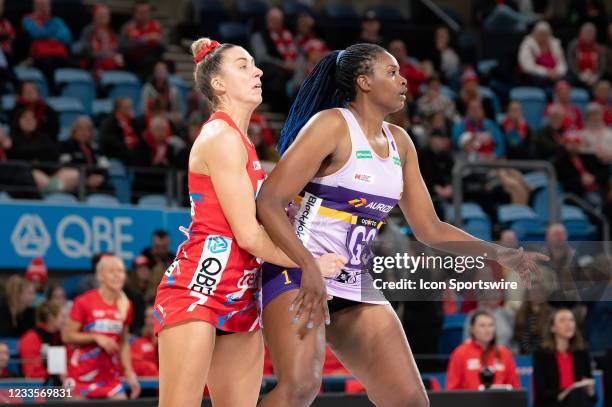 Romelda Aitken of Queensland Firebirds and Sarah Klau of NSW Swifts during the Suncorp Super Netball round eight match between the NSW Swifts and...