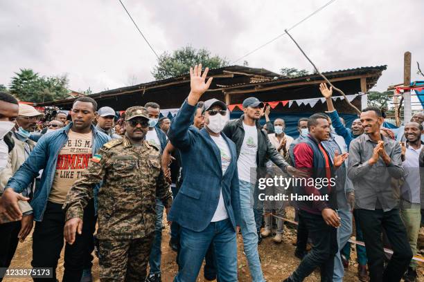 In this handout from Ethiopian Office of the Prime Minister, Ethiopian Prime Minister Abiy Ahmed walks to a polling location to cast his vote in the...