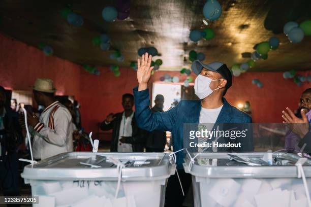 In this handout from Ethiopian Office of the Prime Minister, Ethiopian Prime Minister Abiy Ahmed casts his vote in the country’s national election at...