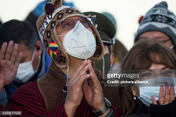 June 2021, Bolivia, Tiwanaku: Luis Arce , President of Bolivia, and his wife Lourdes Brigida Duran take part in an indigenous New Year's ceremony,...