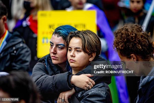 Activists take to the streets during a demonstration demanding that the European Union take action against a Hungarian anti-LGBTI law at the...