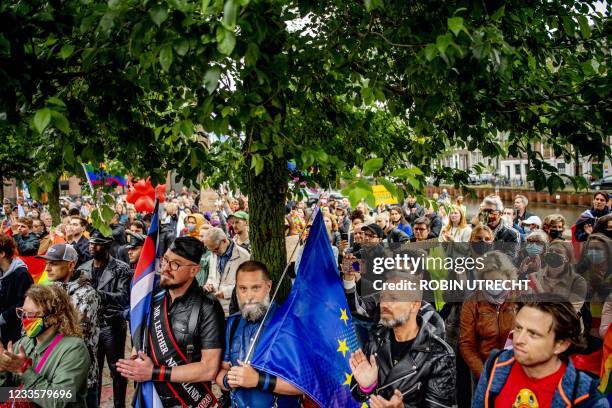 Activists take to the streets during a demonstration demanding that the European Union take action against a Hungarian anti-LGBTI law at the...