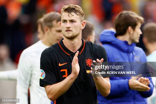 Netherland's defender Matthijs de Ligt celebrates his team's victory at the end of the UEFA EURO 2020 Group C football match between North Macedonia...