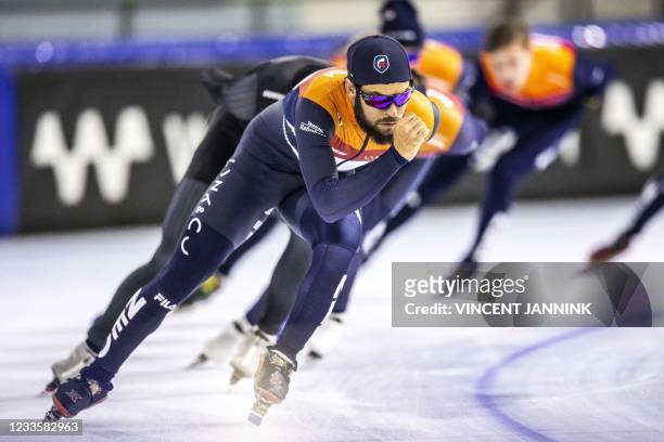 Dutch short track speed skater Sjinkie Knegt sets the pace for the short track selection during the first training session on the summer ice of...