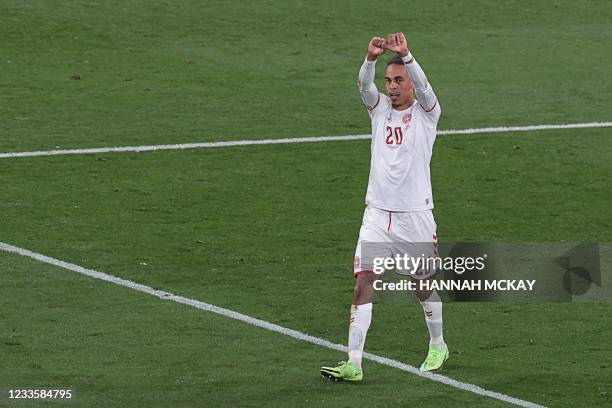 Denmark's forward Yussuf Poulsen celebrates after scoring his team's second goal during the UEFA EURO 2020 Group B football match between Russia and...