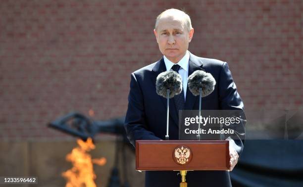 Russian President Vladimir Putin makes a speech during a flower-laying ceremony at the Tomb of the Unknown Soldier to mark the 80th anniversary of...