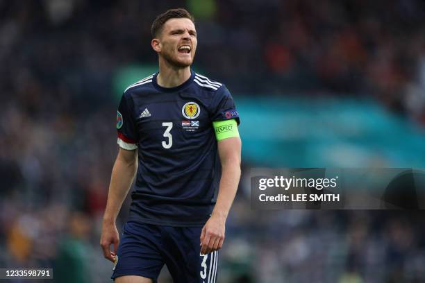 Scotland's defender Andrew Robertson speaks to teammates during the UEFA EURO 2020 Group D football match between Croatia and Scotland at Hampden...