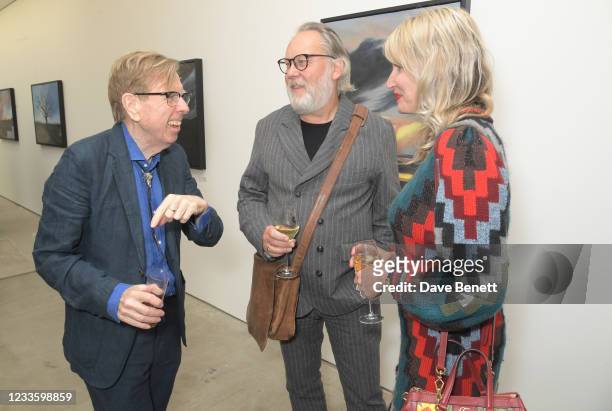 Timothy Spall, Vic Reeves and Nancy Sorrell attend a private view of Timothy Spall's first major solo exhibition "Out Of The Storm" at the Pontone...
