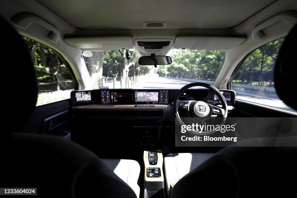 The interior of a Honda Motor Co. E electric vehicle during a test drive in Tokyo, Japan, on Thursday, June 17, 2021. Honda has become the first of...