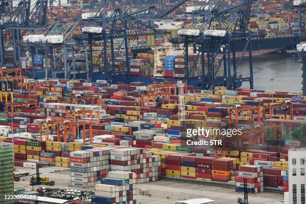 This aerial photo taken on June 22, 2021 shows cargo containers stacked at Yantian port in Shenzhen in China's southern Guangdong province. - A...