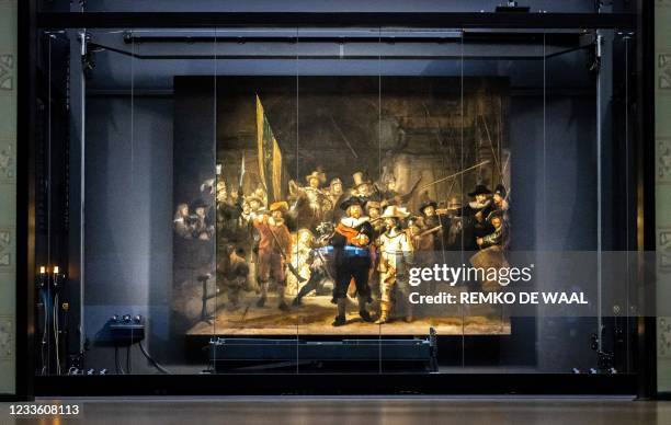 The remounted 1642 'Night Watch' is put in place at the Rijksmuseum Museum during 'Operation Night Watch', the largest ever investigation into the...