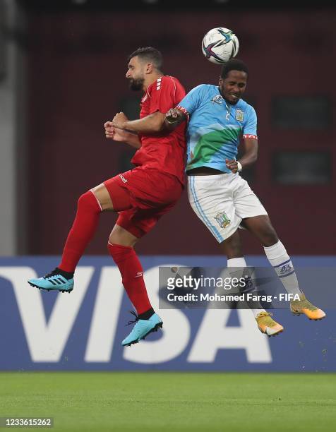 Maher Sabra of Lebanon competes with Mohamed Bourhan of Djibouti during the FIFA Arab Cup 2021 Qualifying match between Lebanon and Djibouti at...