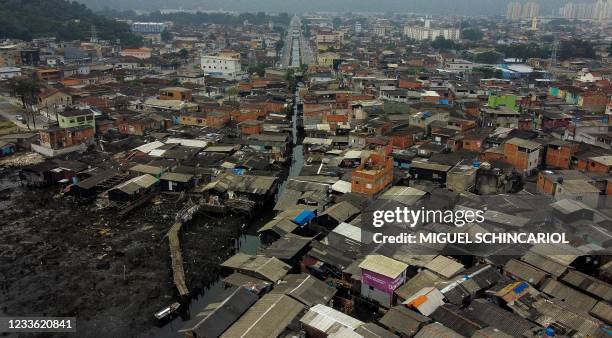 Aerial view of the Dique da Vila Gilda favela, in Santos, Sao Paulo state, Brazil, on June 10, 2021. - The coronavirus pandemic -- which has claimed...