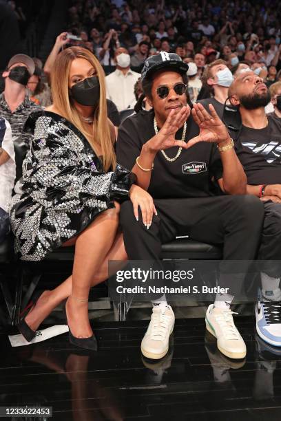 Musicians Beyonce and Jay-Z attend the game between the Brooklyn Nets and the Milwaukee Bucks during Round 2, Game 1 of the 2021 NBA Playoffs on June...