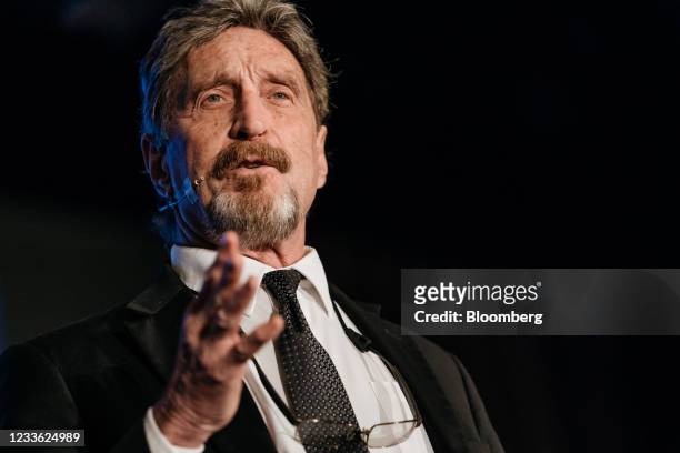 John McAfee, founder of McAfee Associates Inc., speaks during the Shape the Future: Blockchain Global Summit in Hong Kong, China, on Wednesday, Sept....