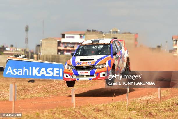 Ugandan driver Yasin Nasser steers his Subaru Impreza with Ugandan co-driver Ali Katumba ahead of the 2021 Safari Rally Kenya during a side-by-side...