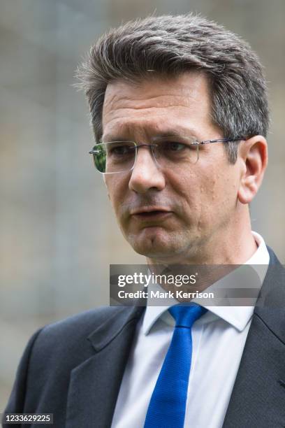 Steve Baker, Conservative MP for Wycombe, shows support to several hundred representatives of the UK's travel industry gathered outside the Houses of...