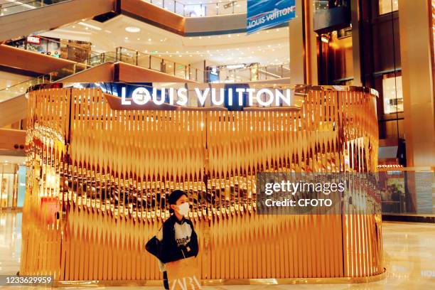 French luxury fashion and leather bag brand LouisVuitton launches a pop-up store at the LuxuryBrand Roadshow at the Shanghai Global Port in Shanghai,...