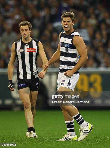 Tom Hawkins of the Cats celebrates a goal during the round 24 AFL match between the Collingwood Magpies and the Geelong Cats at Melbourne Cricket...