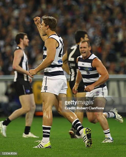 Tom Hawkins of the Cats celebrates a goal during the round 24 AFL match between the Collingwood Magpies and the Geelong Cats at Melbourne Cricket...