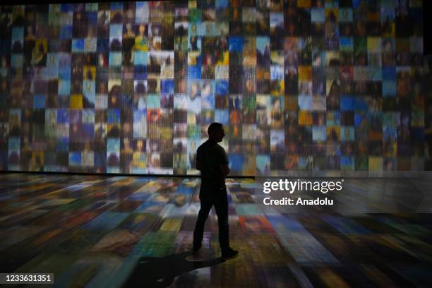 People visit Parallel Universe Exhibition by Ouchhh, combining artificial intelligence and art in Atasehir Metropol Istanbul, on June 24, 2021 in...