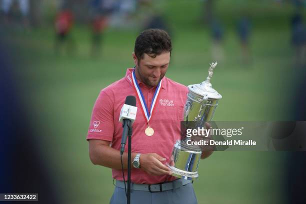 Jon Rahm holding US Open Championship trophy and wearing Jack Nicklaus god medal after winning tournament at Torrey Pines GC. San Diego, CA 6/20/2021...
