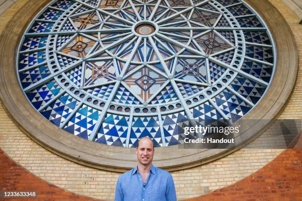 In this undated handout photo provided by Kensington Palace, Prince William, Duke of Cambridge stands in front of Alexandra Palace's Rose Window as...