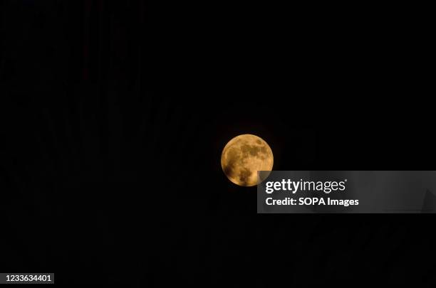 Full moon, known as the Strawberry Super-moon rises over the city of Srinagar. The Strawberry Super-moon is the last of this years super moons, where...